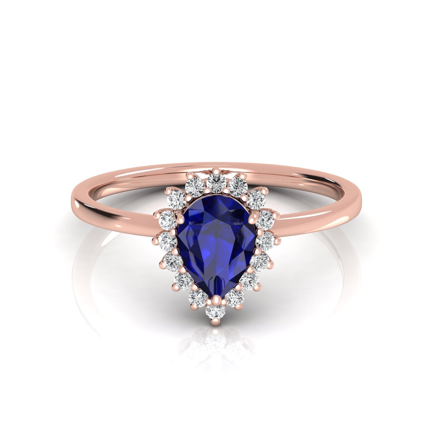 8.00 x 6.00 mm Pear Cut Created Sapphire and 1/6 ctw Lab Grown Diamond Halo Engagement Ring - Elegant pear-cut sapphire surrounded by a halo of lab-grown diamonds, perfect for a sophisticated engagement