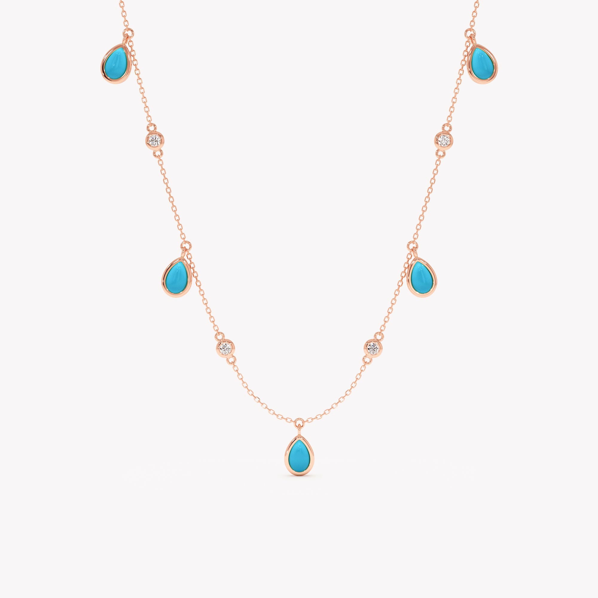 Necklace with turquoise teardrop pendants on a white background